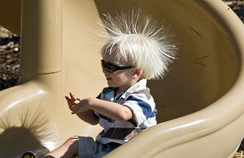child on slide gaining charge of static electricity child on slide gaining charge of static electricity