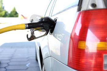 filling a car with petrol/gasoline filling a car with petrol/gasoline